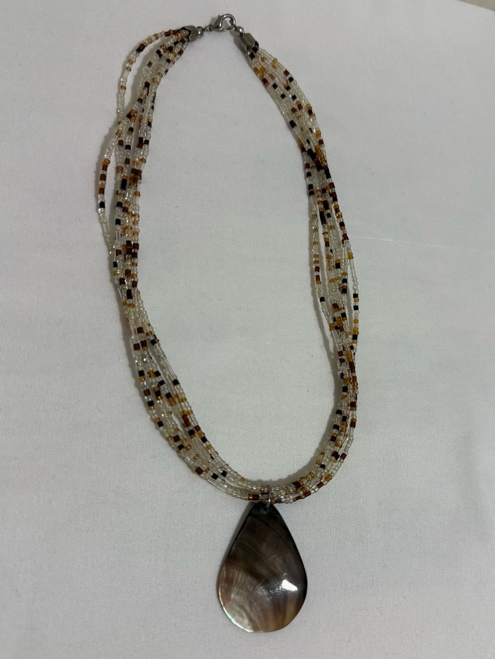 Beaded Multi-Strand Necklace with Brown Teardrop Pendant